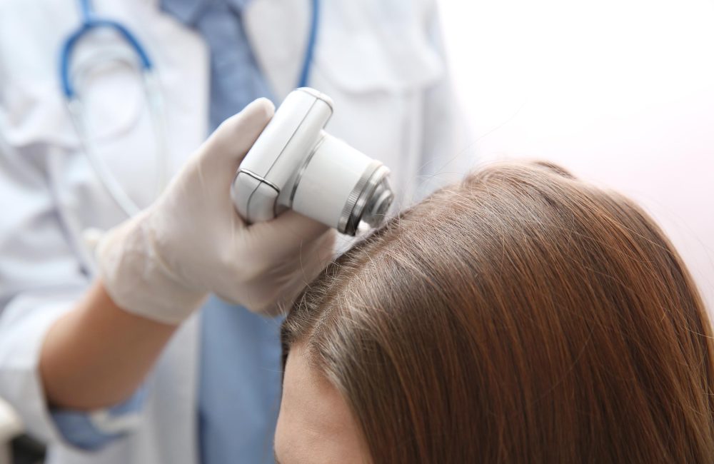 Woman visiting dermatologist at clinic